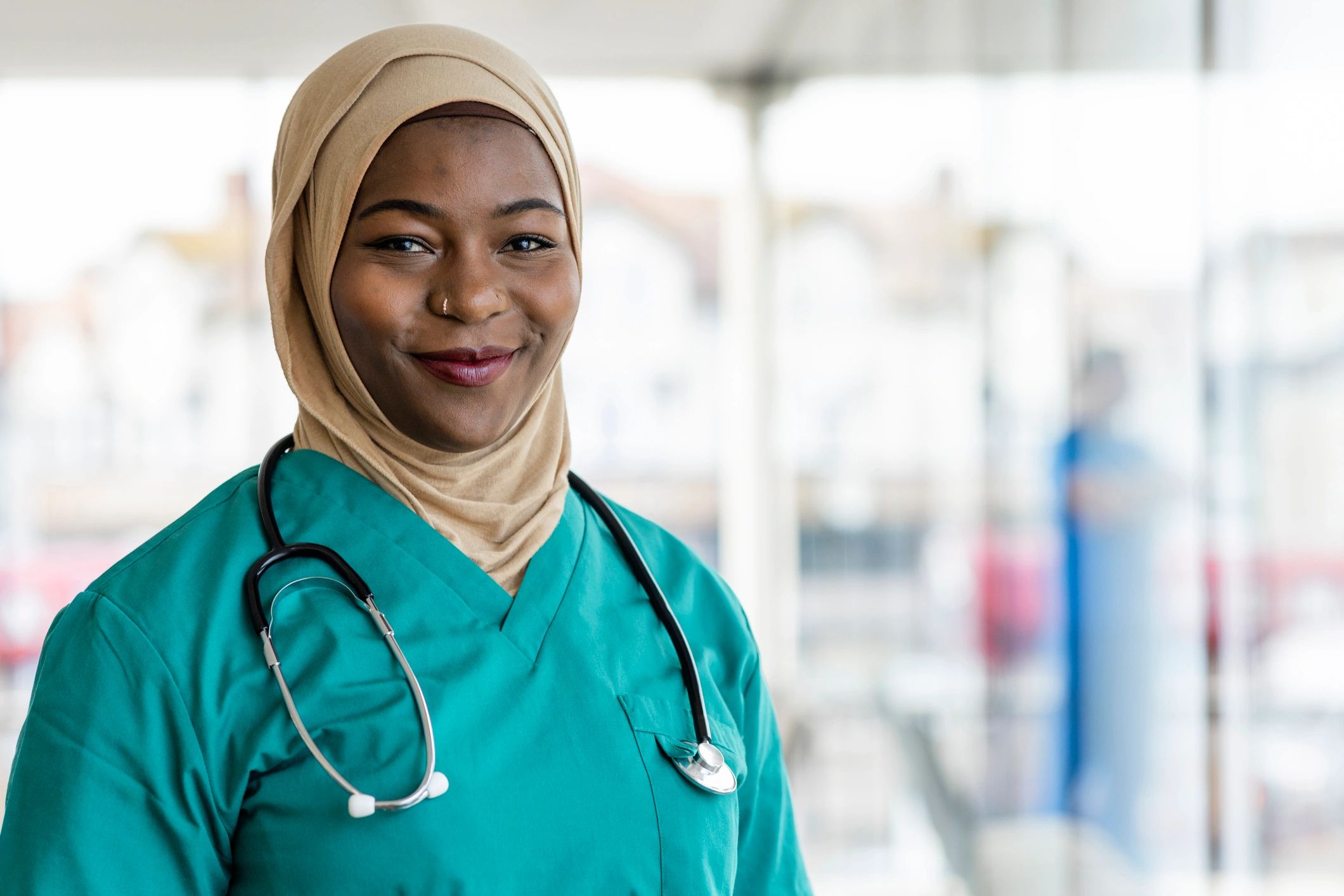 Black female nursing instructor smiling in a healthcare training setting