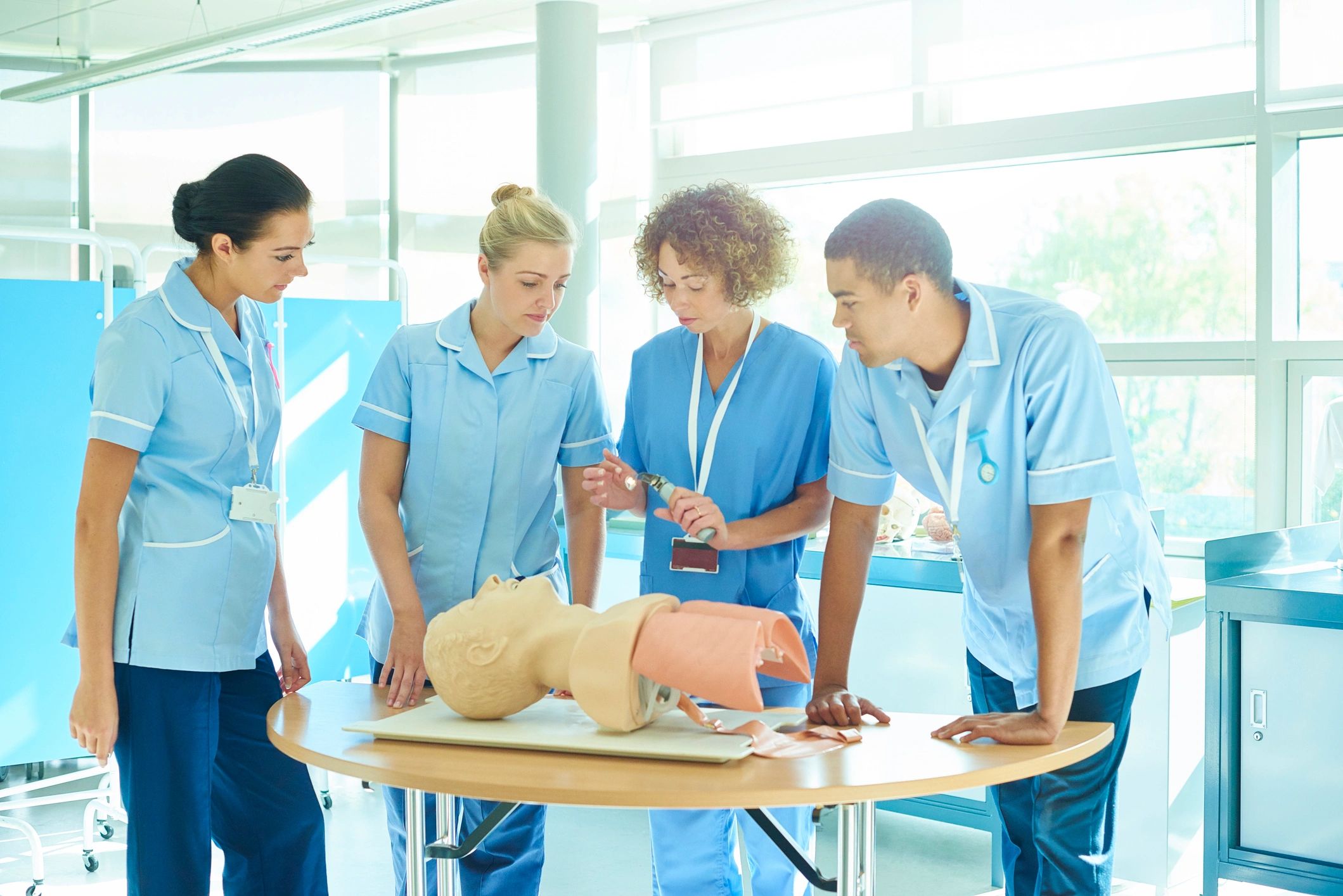 Instructor presenting to a classroom of healthcare students